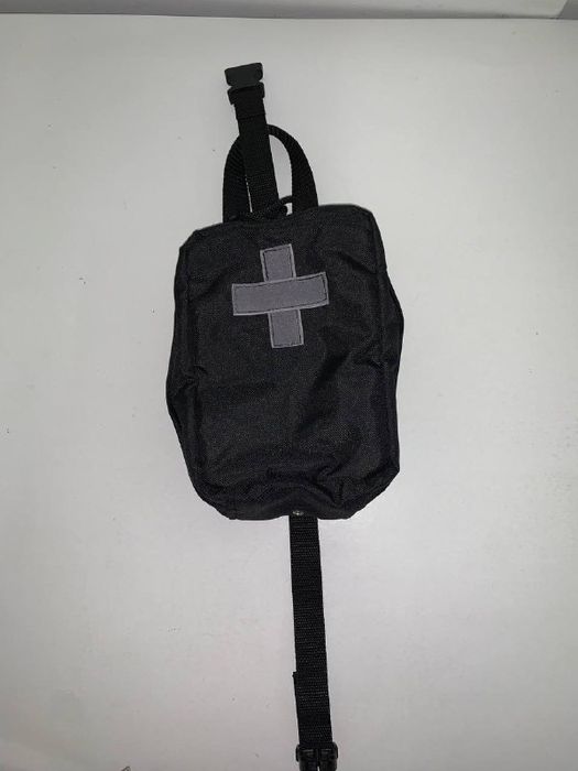 Quick release first aid kit